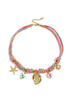 Rope chain with knots and shell charms